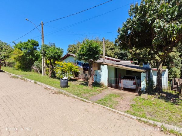 Amplo terreno com casa mista 3 dormitórios em Taquari RS