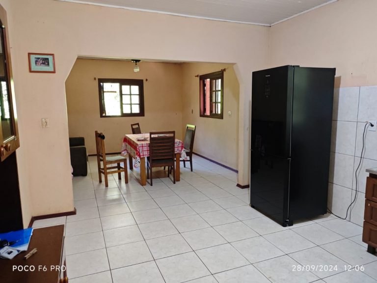 Amplo terreno com casa mista 3 dormitórios em Taquari RS