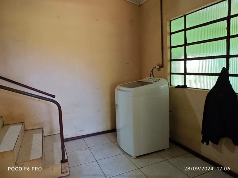 Amplo terreno com casa mista 3 dormitórios em Taquari RS