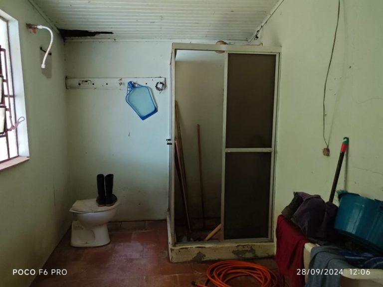 Amplo terreno com casa mista 3 dormitórios em Taquari RS