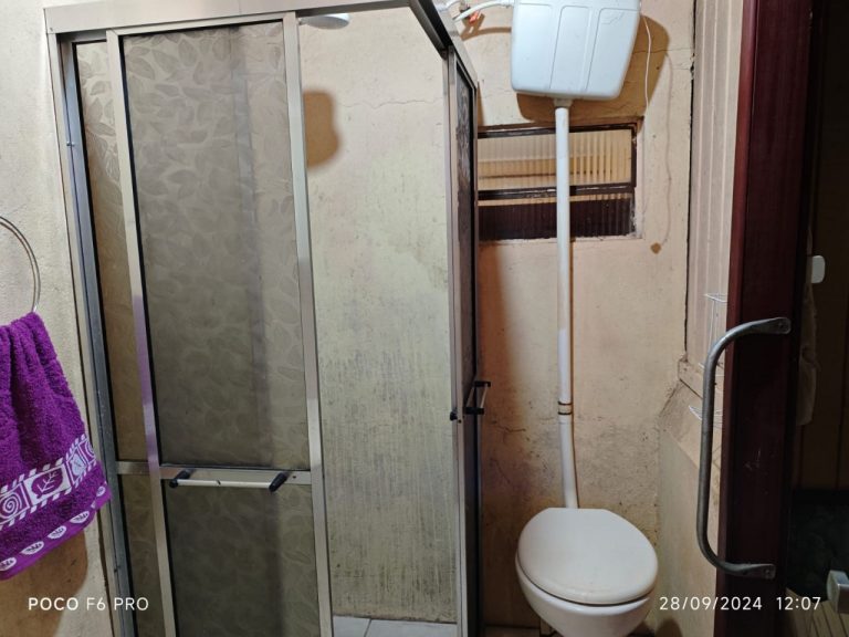 Amplo terreno com casa mista 3 dormitórios em Taquari RS