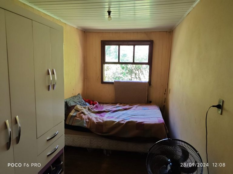 Amplo terreno com casa mista 3 dormitórios em Taquari RS
